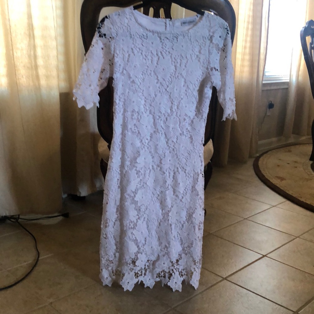 Nina Leonard white dress.